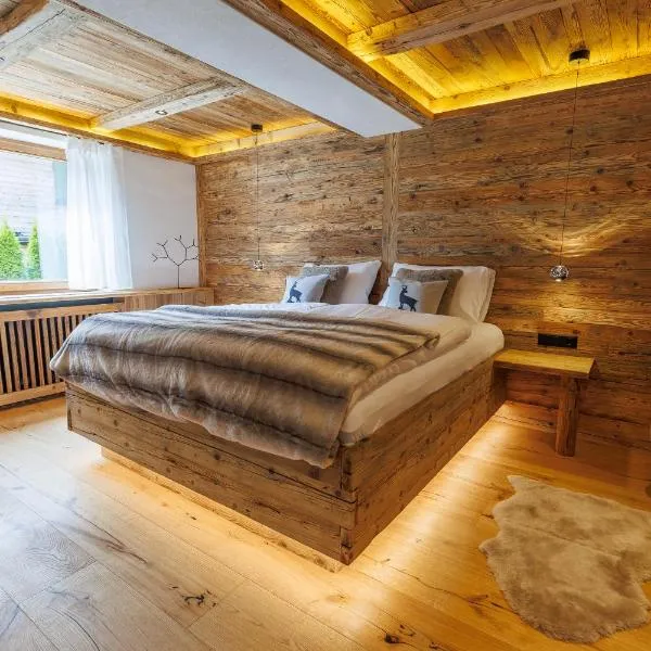 Die Steinberg Chalets - Boutique-Apartments mit privater Sauna und Bergblick, hotel i Sankt Ulrich am Pillersee