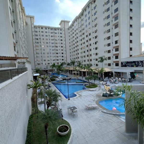 Flat completo no centro com piscinas e lazer