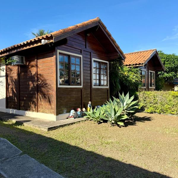 Casa de madeira com piscina