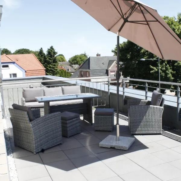 Über den Dächern von Grasbergs City โรงแรมในGrasberg