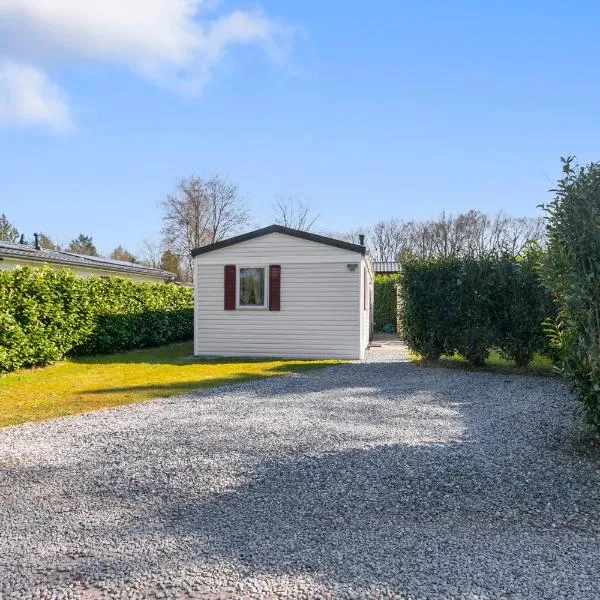 Knus chalet in de bossen van Epe met fietsen, hotel en Epe