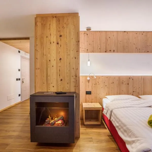 Chalet Osmar Suite 1, Hotel in Campitello di Fassa