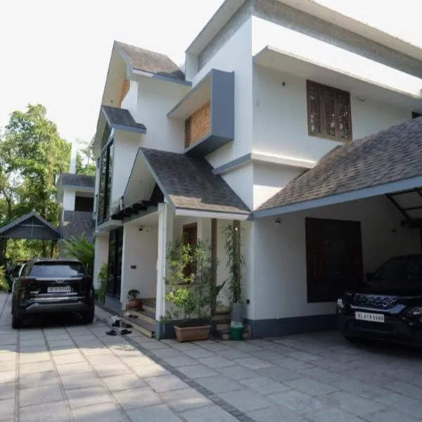 CRK Home Stays، فندق في كوتشي