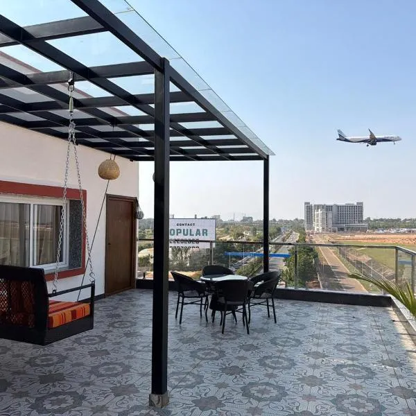 Viesnīca Runway Retreat Rooftop Swing, Airport View pilsētā Muthugadahalli