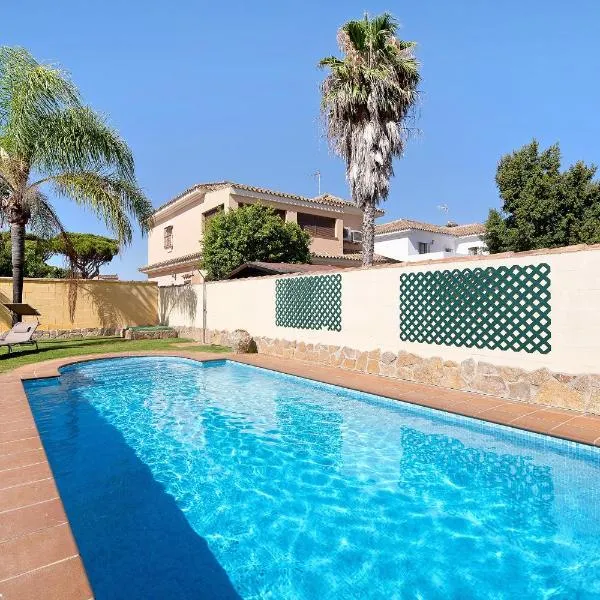 Chalet con piscina en la Barrosa, hotel Chiclana de la Fronterában