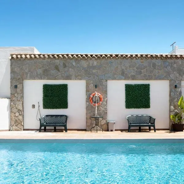 Chalet Fuente2 piscina común famila, Hotel in Conil de la Frontera