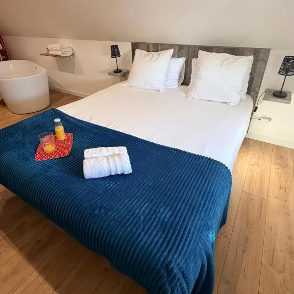 Aux Charmes-Suites cosy et independantes equipees d un frigo, micro ondes et nespresso, hotel Isques városában