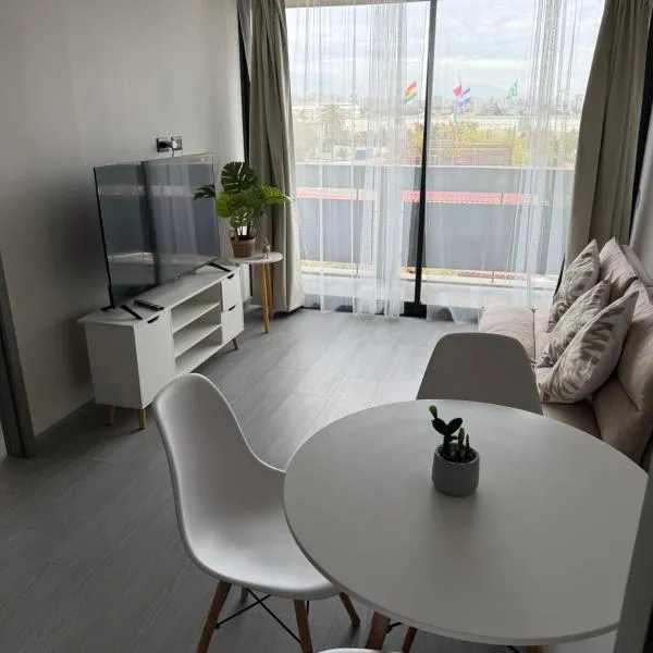 A pasos de Santander Arena, estacionamiento incluido, hotel em Santiago