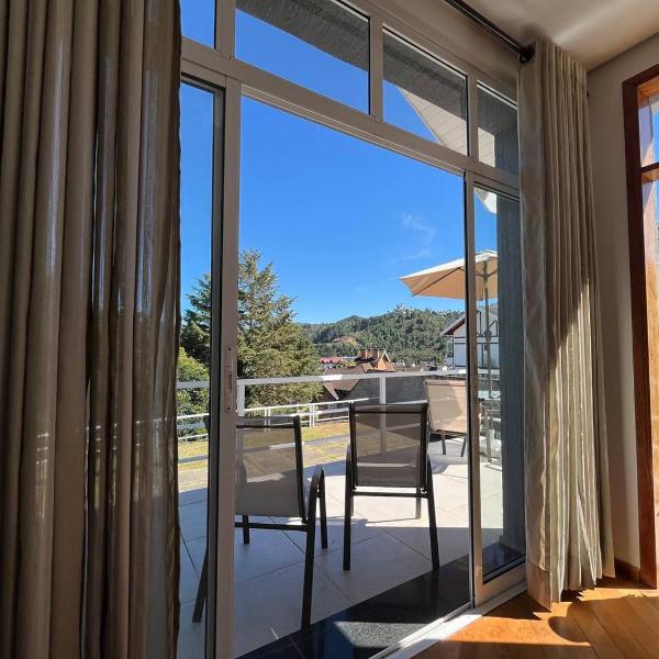 Casa para 9 pessoas no Capivari, 4 min a pé do Baden Baden - Vista, lareira, área gourmet e mais