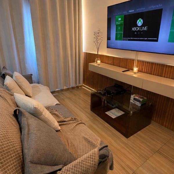 O Refúgio Secreto da Família Valle no Canto do Forte 2 Quartos, Ar, aquecedor, Xbox 360, Pet, Vaga SUV e 4 min da Praia
