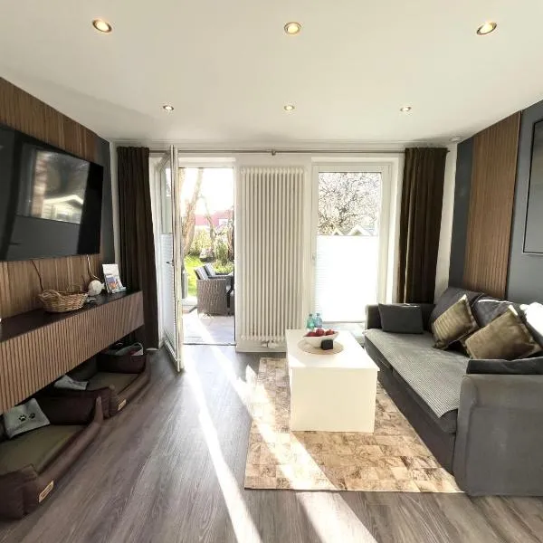 Hafenglück - moderne Ferienwohnung direkt am Hafen in Carolinensiel, hotel v destinaci Wittmund