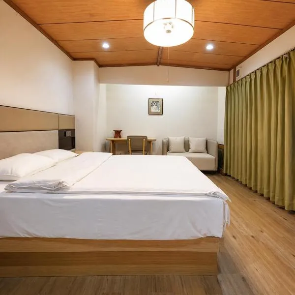 Kurmon Inn, hotel Omacsiban