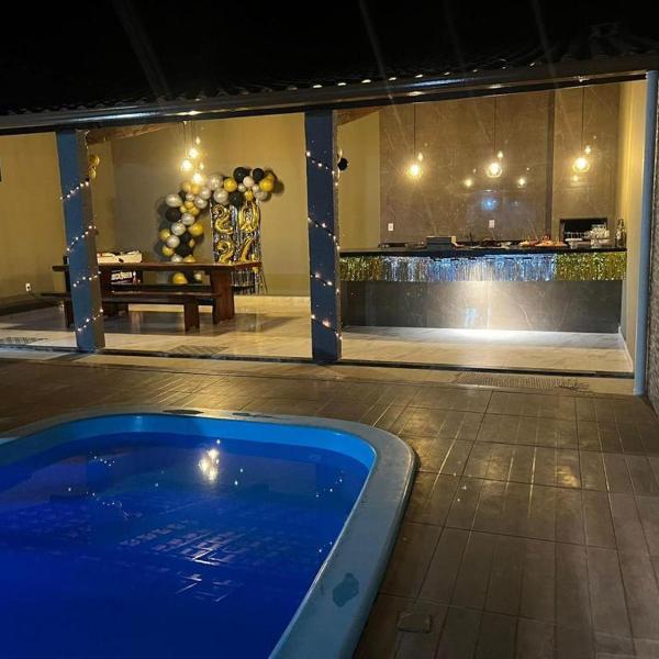 Casa pé na areia com piscina em corona vermelha