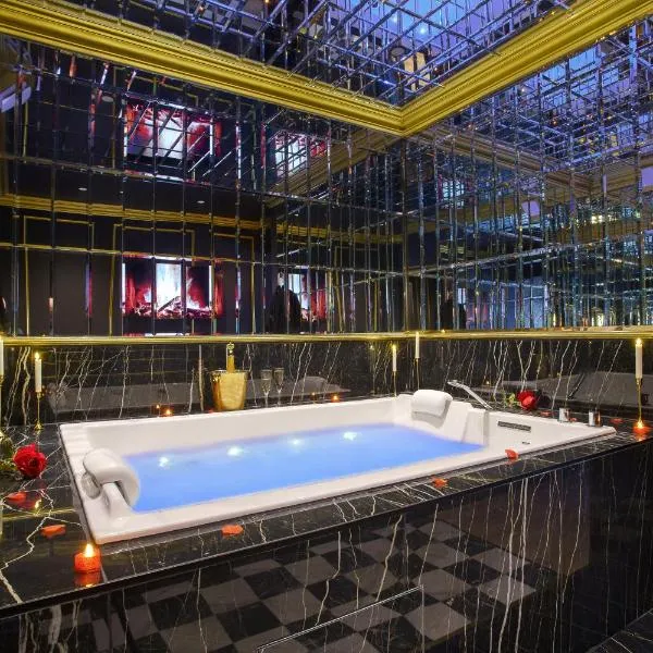 Suite de Luxe - Jacuzzi Privatif - Cinéma - Sedan, hotel en Sedán