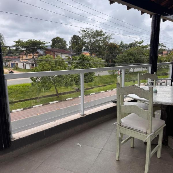 Casa de temporada pe na areia indaia proximo a praia