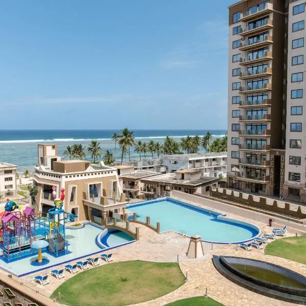 Sandy Shore Beach Apartments - Karibu Quarters, hotel u gradu Kikambala
