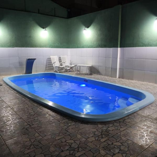 Casa Com Piscina na Praia na Praia da Enseada muito aconchegante e espaçosa