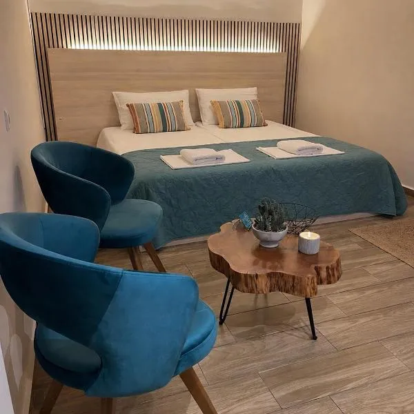 Garden Square Inn, hotel a Markopoulon