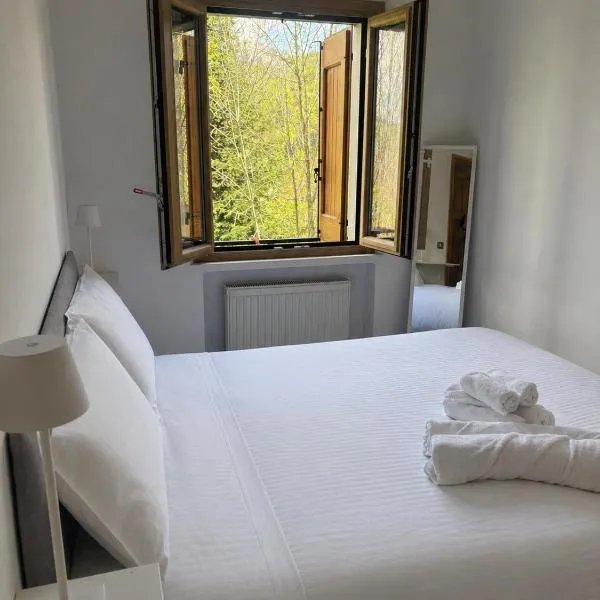 Cozy Mountain Apartment with Cimone view，位于Faidello的酒店