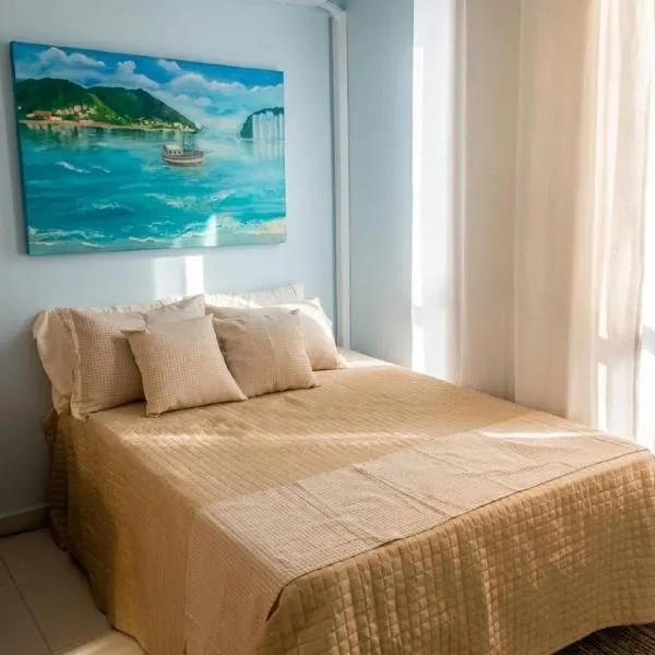Refúgio exclusivo frente mar no Gonzaga com garagem, hotel a Santos