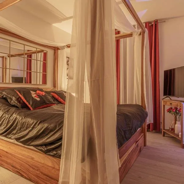 Suite romantique LMF SPA intérieur piscine privés jardin et lit King size, hotell sihtkohas Rousson