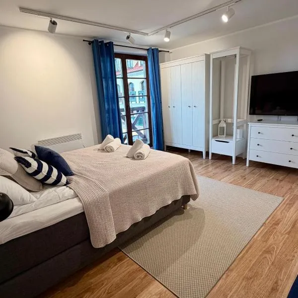 MazuryHoliday Apartament Gigu Mikołajki、ミコワイキのホテル