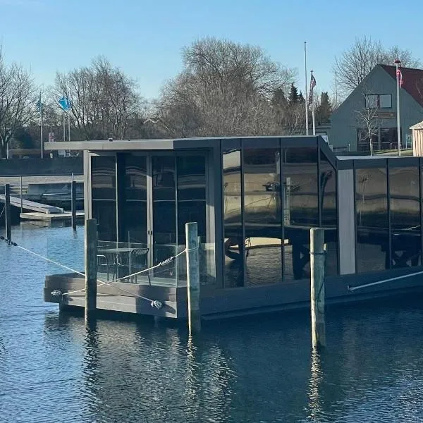 Hyggeligt ophold i hjertet af Bogense Gamle Havn, hotel in Bogense