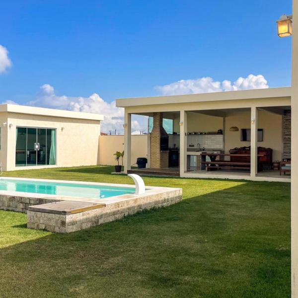 Casa no Valtellina com Piscina e Lagoa Privativa
