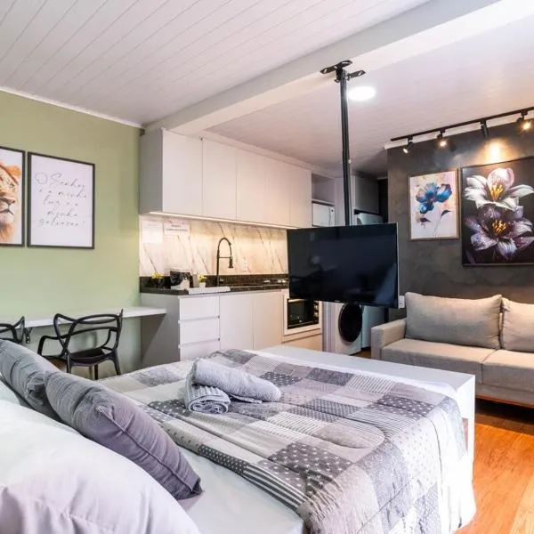 Studio c AC, Piscina e Café Novo Hamburgo, מלון בנובו המבורגו