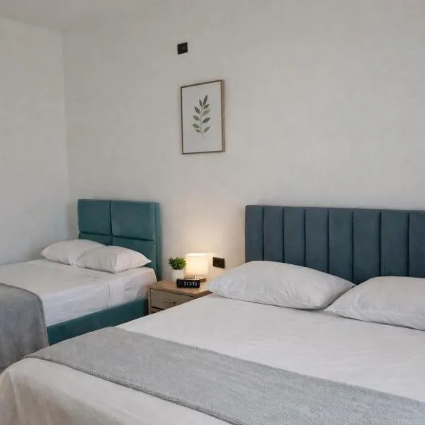 Spacious Triple Room with Balcony, hotel in Kamëz
