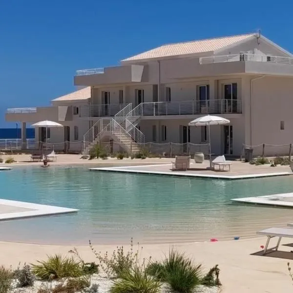 Casa di Rita, Attico vista mare a Marzamemi - 2 Piscine e Padel, готель у місті Марцамемі