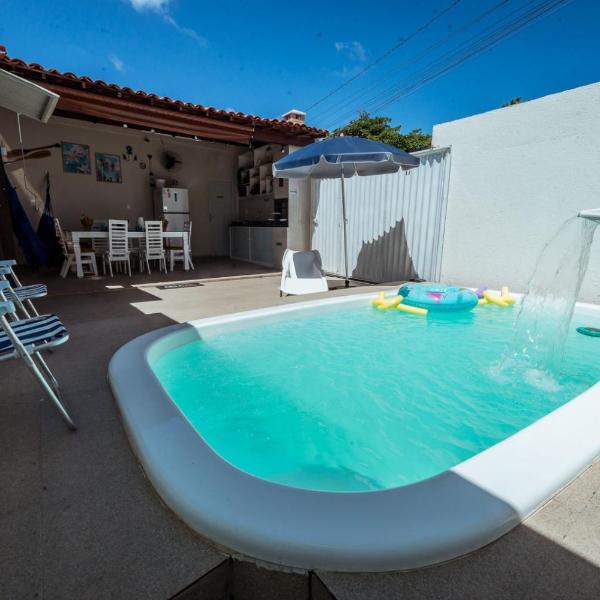 Casa em Praia Formosa com 4 Suítes, Piscina, Churrasqueira e Garagem