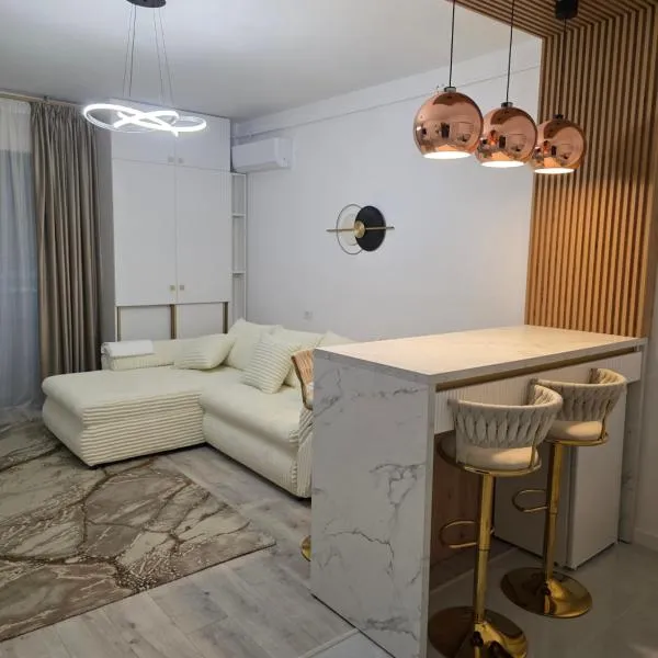 Apartament DeLux cu Jacuzzi Caciulata, מלון בCăciulata