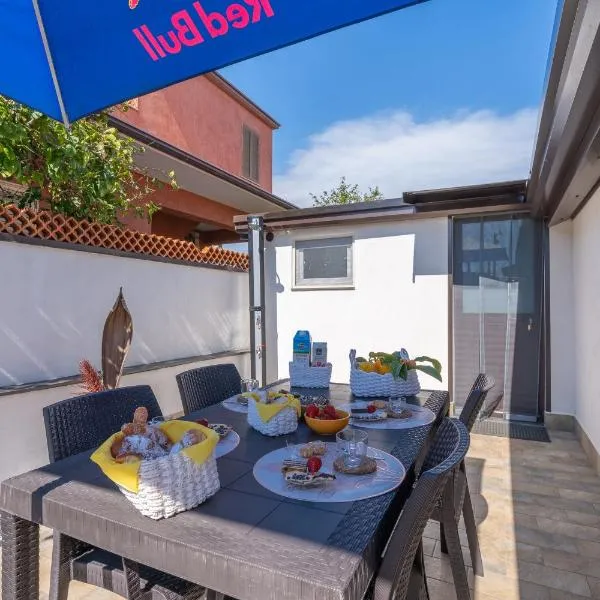 Trifamiliare Garden - Sole, Hotel in Agnone Bagni