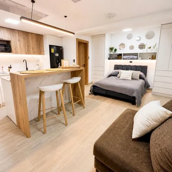 Suite Moderno y Acogedora con Ubicación Ideal de un solo ambiente, hotel in Quito