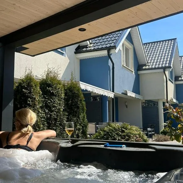 Domki Kapitańskie Lubiatowo z sauną i balią z jacuzzi, hotell sihtkohas Lubiatowo