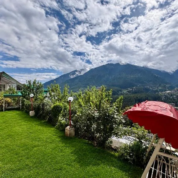 The Mountain Peak Retreat, hotel in Manāli