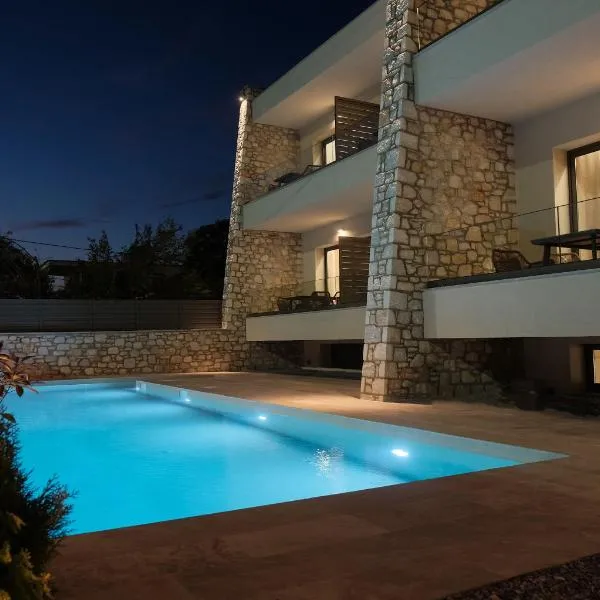 Almondo Suites, ξενοδοχείο σε Amigdhaleón