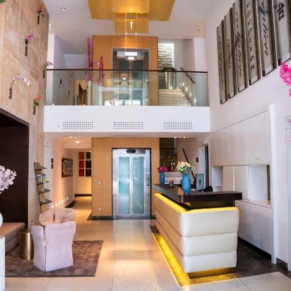 Luxury Boutique Hotel Iris Porsche, hotel en Mondsee