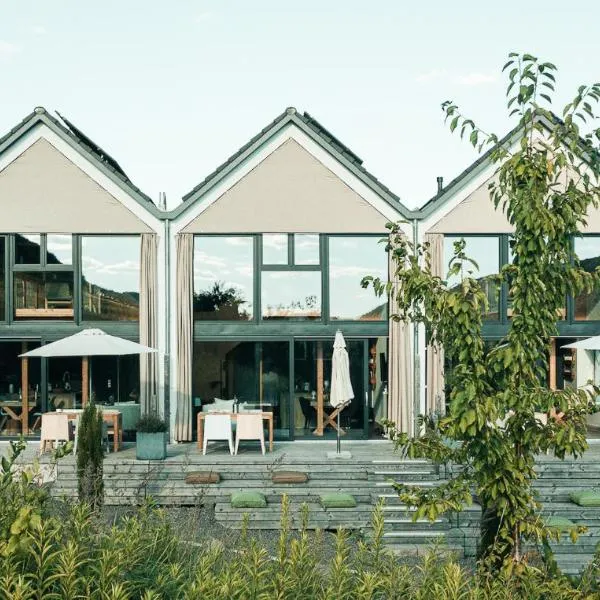 3 Design Ferienhäuser direkt am Weinberg, für je 2-4 Personen, Wandern, Radfahren, Ausflüge - Hochwertige Ausstattung - Mosel Chalets, готель у місті Pommern