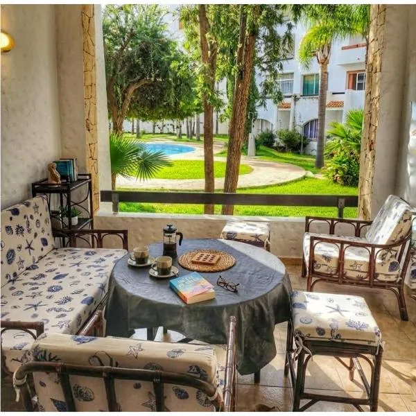 L'Olivier à Marina Golf Vue sur Piscine, Wi-Fi et Clim, hotel en Asilah