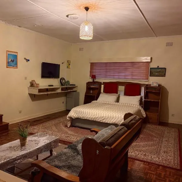 Ensuite Bedroom Near RG Mugabe Airport, hôtel à Harare