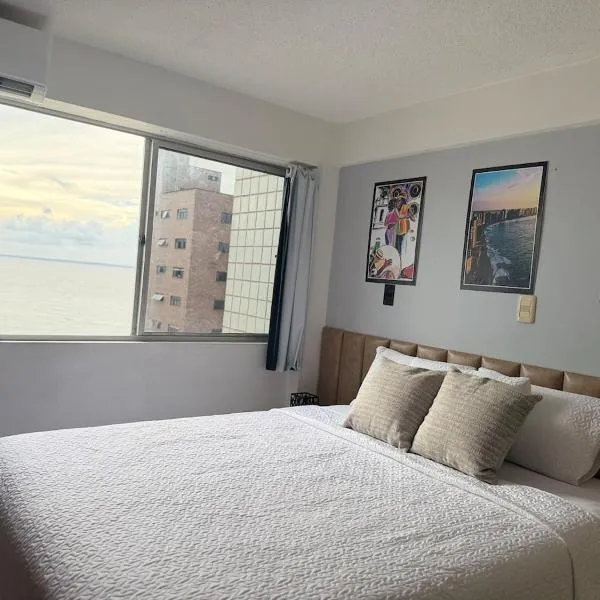 Flat1 praia Ponta Areia vista mar boa localização, отель в городе Сан-Луис