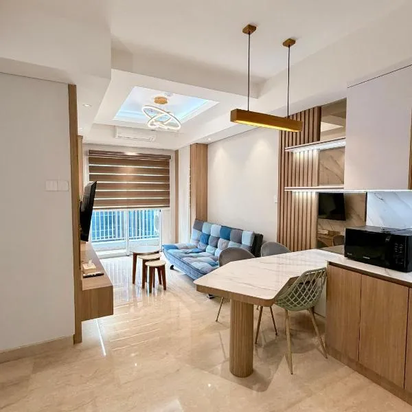 Homey & Cozy Podomoro Apartment - Strategic Location 3Beds 1Sofabed 2Bathroom, hôtel à Medan
