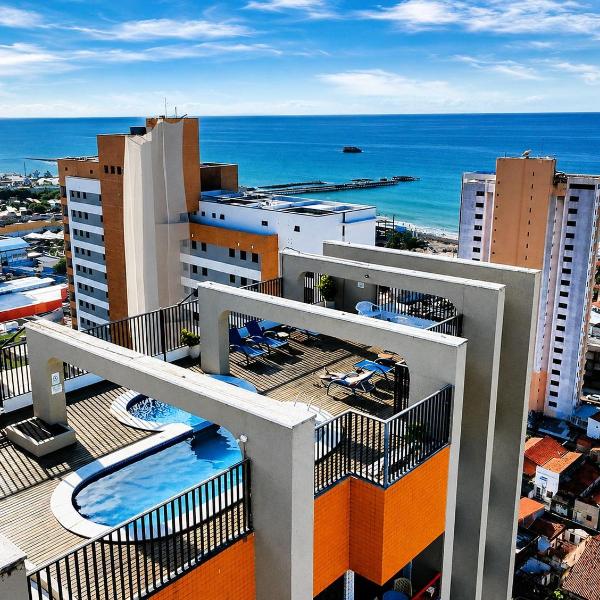 Hosts BR - Condomínio com Rooftop e Vista Mar
