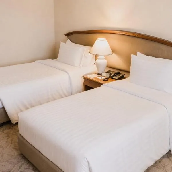 The Twin Lotus Hotel، فندق في ناخون سي ثامارات