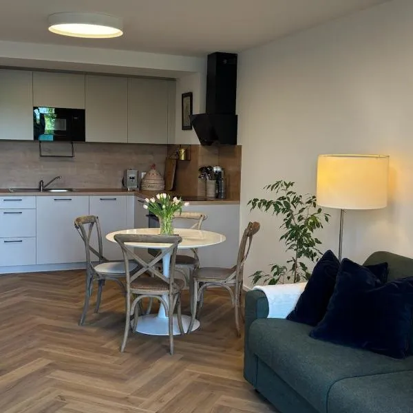 Pioneer house - app with free parking place, terrace and private garden, hotel di Koliba