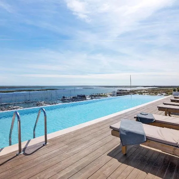 Ria Front Paradise โรงแรมในโอลเญา