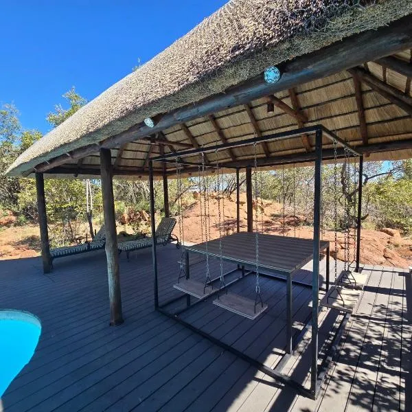 Milkwood Safari Lodge, hotel Warmbathsban