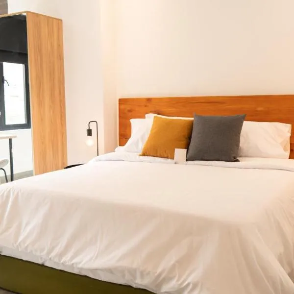 Once Suites, viešbutis mieste Envigadas